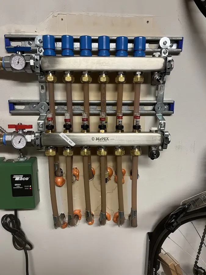 Plumber performing Gas Leak Detection at a residential property in East Hampton